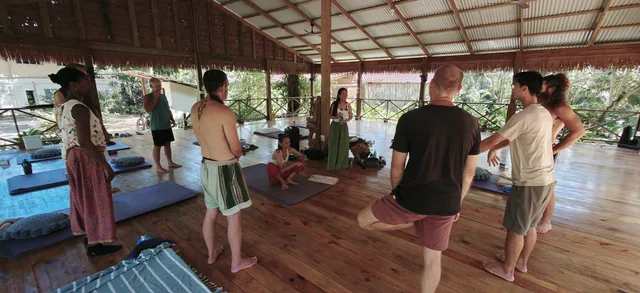 The group moving together in the open-air pavilion